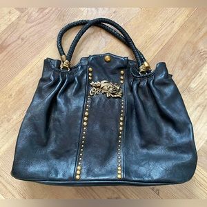 Rare and beautiful vintage black leather Juicy Couture handbag with brass